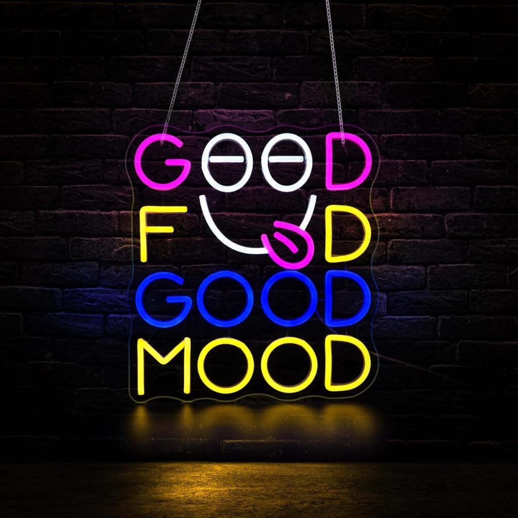 good food good mood led sign hanging on kitchen wall